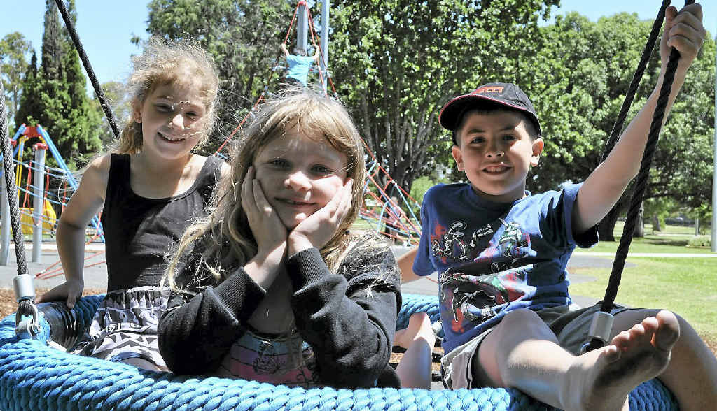 Brittany Lawler, Tahlia Lawler and Kaine Worth have fun on the playground equipment at Leslie Park. Brittany Lawler, Tahlia Lawler and Kaine Worth have fun on the playground equipment at Leslie Park.